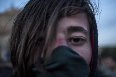 One of the demonstrators is a 20 year old boy who covers his face to avoid being recognized by the police. April 17, 2018, Yerevan-Armenia.
