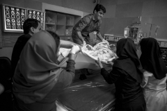 The hospital staff and nurses attempt to move his body from I.C.U to the operating room, to prepare him for the operation.(Donating his body parts).In a hospital in Tehran. 21 Jan 2014.