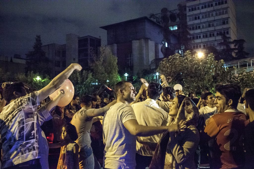 Iranian celebrate victory over Morocco during World Cup 2018. People take to streets of Tehran after Iran defeat Morocco in Russia. June 2018- Tehran.